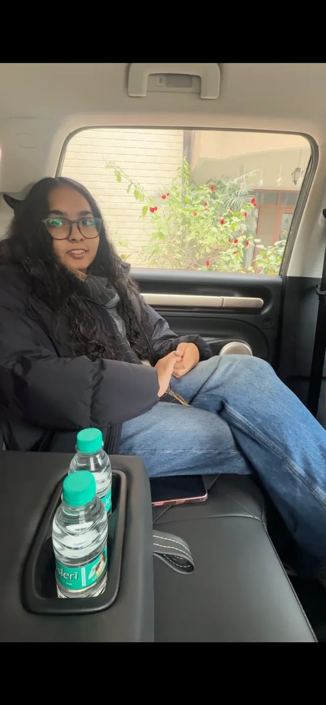 Myrah A. sitting comfortably in a Trevel cab